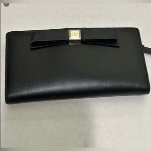 KATE SPADE Long Black Leather Bi-Fold Wallet With Pink Monogramed Lining.